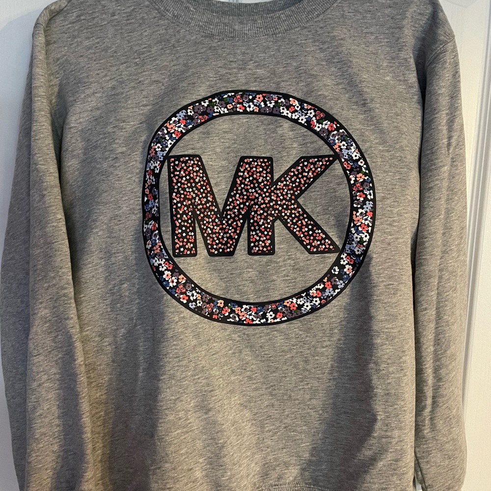 Size medium MK sweatshirt in excellent condition. So cute & comfy!